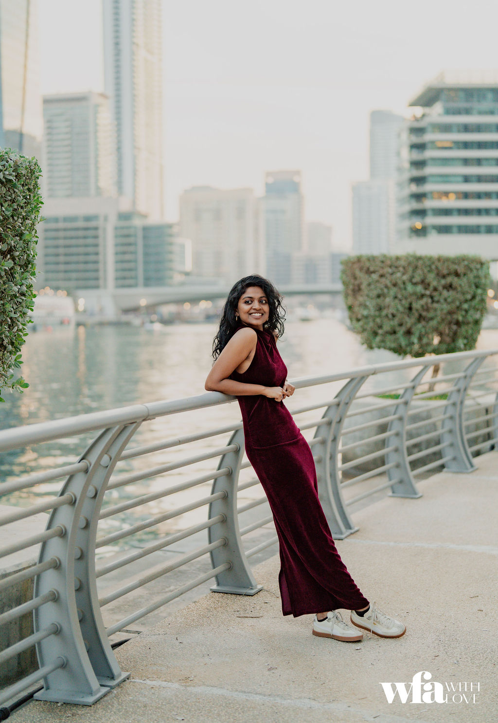 Bride smiling by the railing